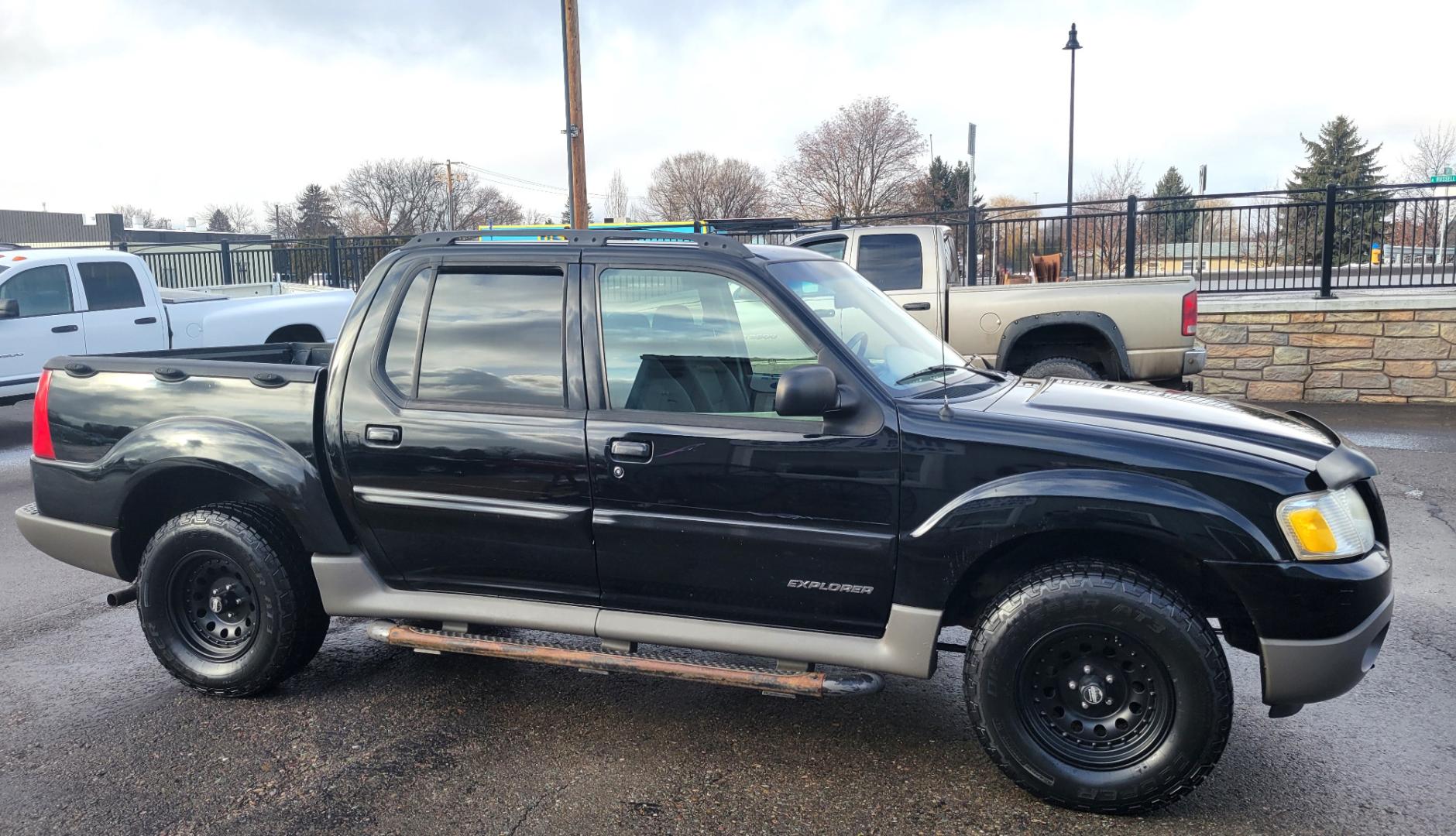 2001 Black /Black Ford Explorer Sport Trac Sport Trac (1FMZU77E41U) with an 4.0L V6 engine, Automatic transmission, located at 450 N Russell, Missoula, MT, 59801, (406) 543-6600, 46.874496, -114.017433 - Hard to find Truck / SUV. 4 Wheel Drive. Automatic Transmission. Nice Wheels and Tires. Power Windows and Locks. Power Back Window. AM FM CD. Air. Cruise. Tilt. Financing is not available on this vehicle. - Photo#4